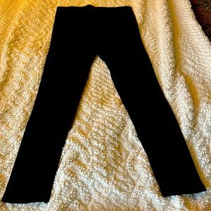 Black spandex ish pants. Never worn.